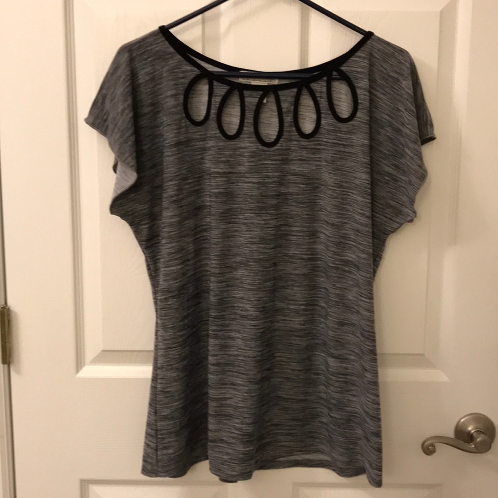 Dressy blouse with peek a boo neckline